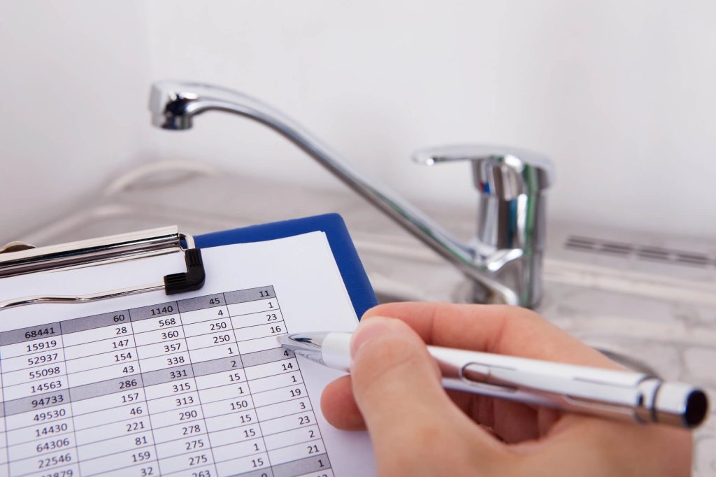 Hand Writing Consumption Level On Clipboard
