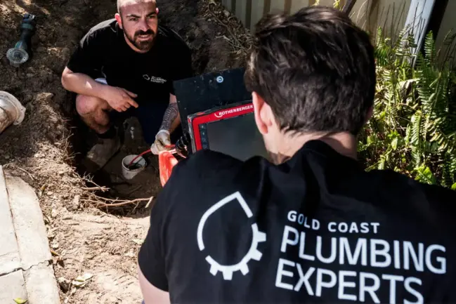 What to do when you notice these signs – professional plumbers on the Gold Coast using CCTV inspection equipment to diagnose blocked drains.